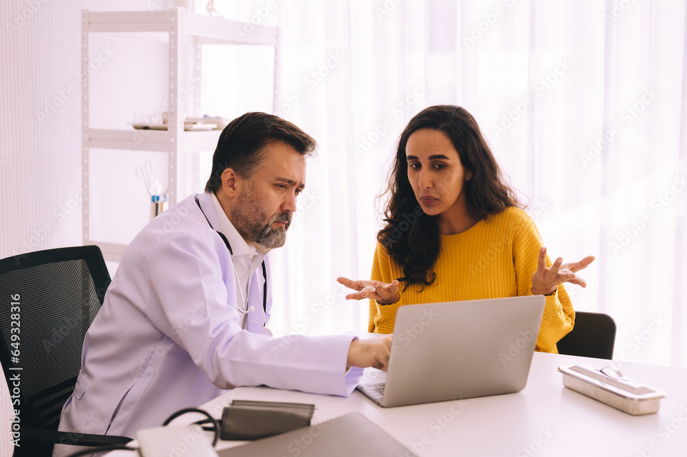 Serious doctor consulting woman and showing her test results on digital tablet, healthcare and medical concept, copy space