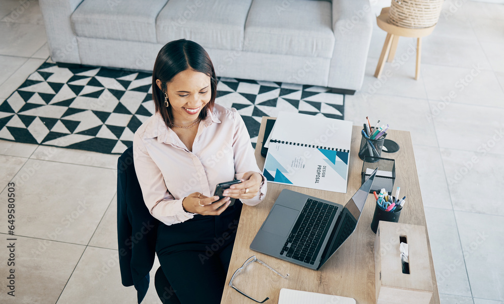 Smartphone, smile and business woman at table in home living room on social media, internet search and freelancer typing. Designer on phone at desk, reading email and communication for remote work