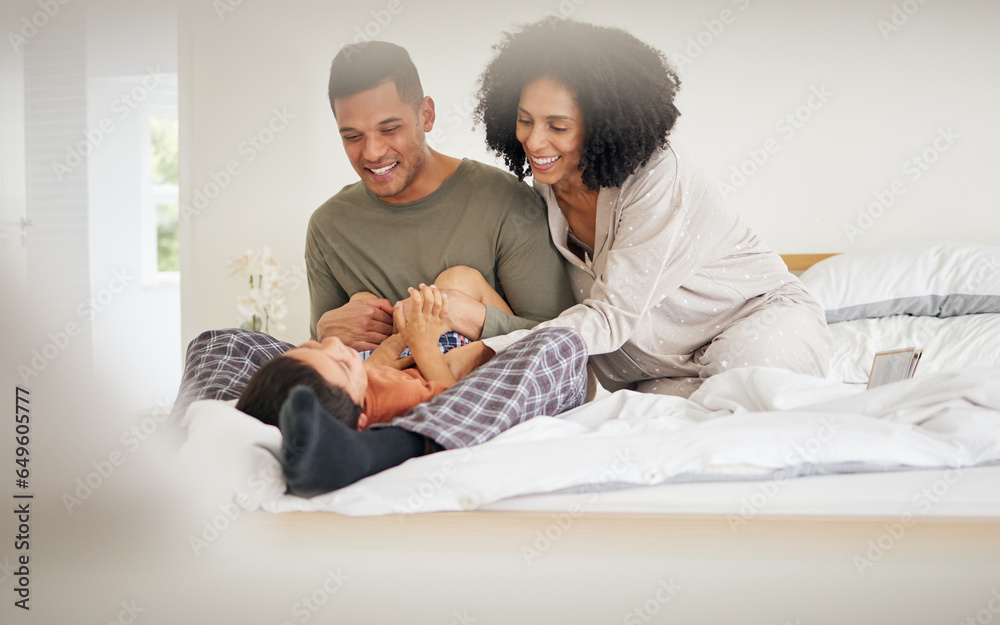 Happy, family tickle and bedroom with laughing with bonding of father, mother and child smile. Home, mom and dad together with love, bonding and care in bed in morning with kid in house with parents