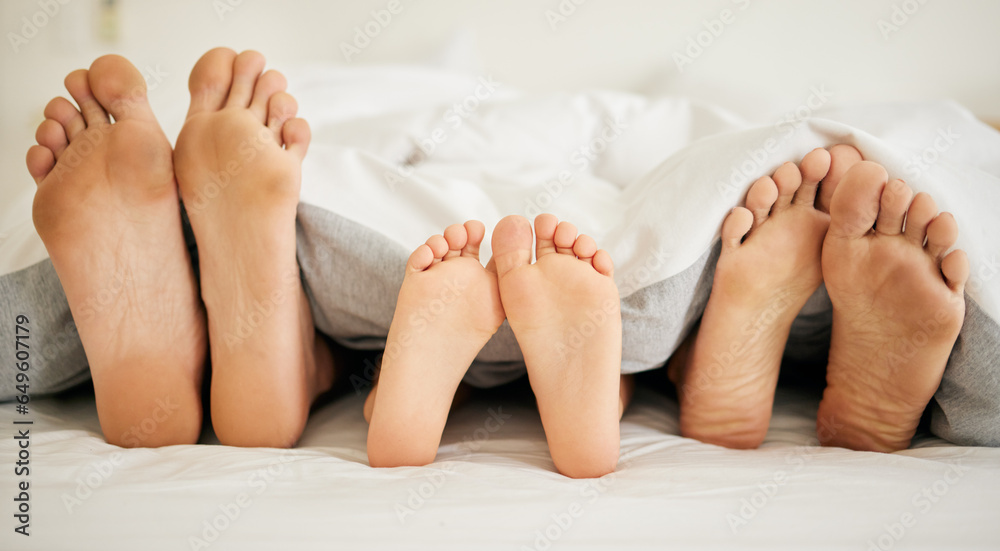 Feet, family and sleeping on bed in bedroom of home together for rest, relax and comfort in the morning. Apartment, mattress and people nap for stress relief, vacation or weekend in san francisco