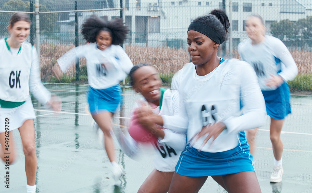 Netball , sports and team with game and women for defend in competition, match or group practice. Motion blur, action and player workout, exercise and athlete training, teamwork fitness on court