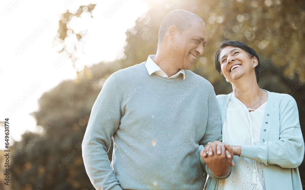 Happy, love and senior couple in a park on an outdoor date for romance, bonding or love. Smile, talking and elderly man and woman in retirement in conversation walking in a field together at sunset.