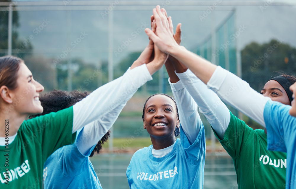 High five, community and team of volunteers with success, motivation and problem solving with solution together. Teamwork, charity and group of women winning at equality in unity and solidarity