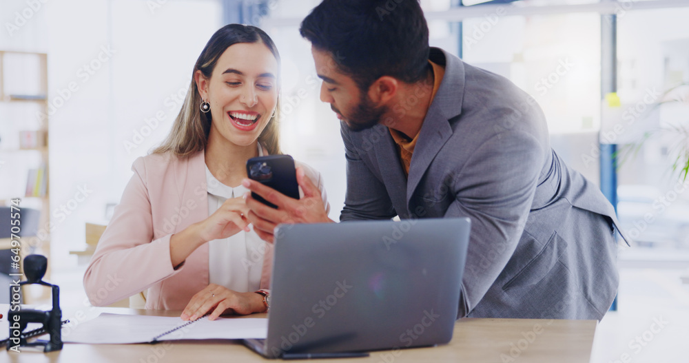 Phone, business people and friends in office laughing at joke, comedy or humor. Cellphone, happy or employees, man and woman online browsing, social media or laugh at funny or comic meme in workplace