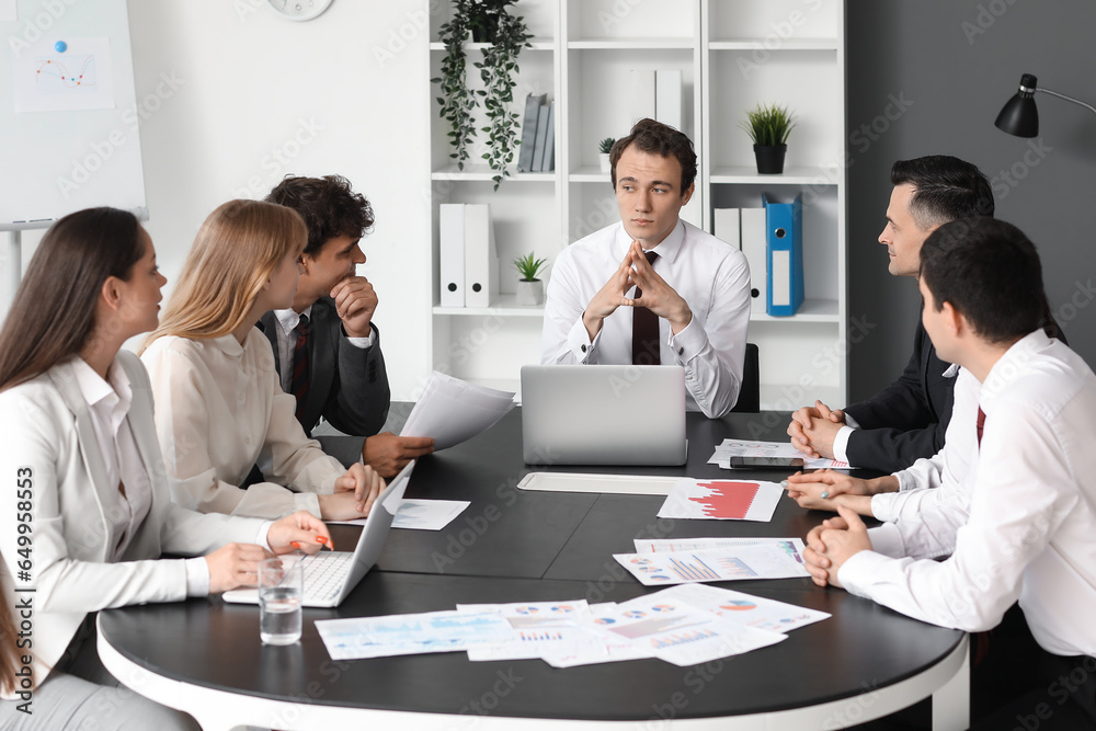 Group of business consultants working in office