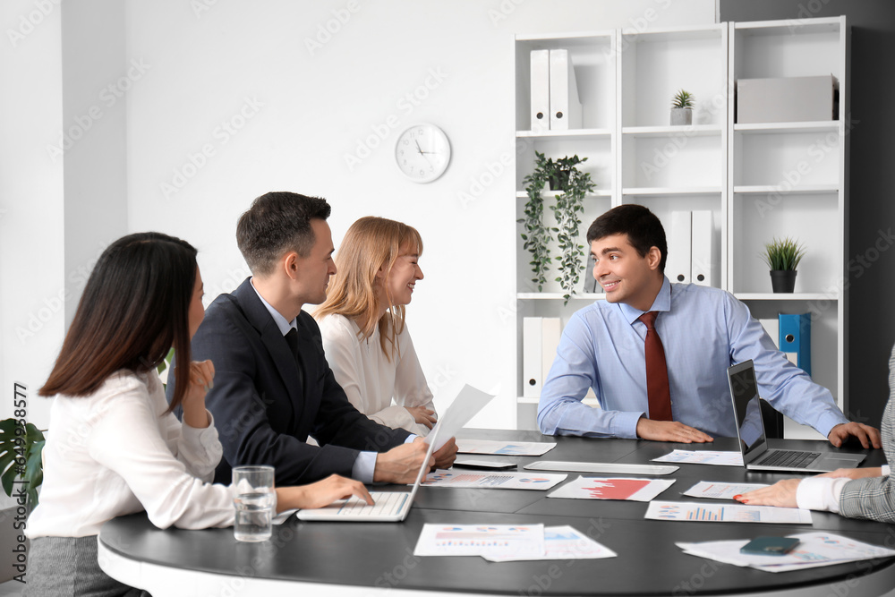 Group of business consultants working in office