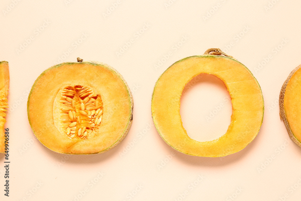 Pieces of sweet melon on pink background