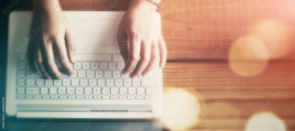 Mockup, hands typing on laptop from above, business person online at desk with bokeh. Technology, communication and networking, worker writing research report or feedback email on computer keyboard.