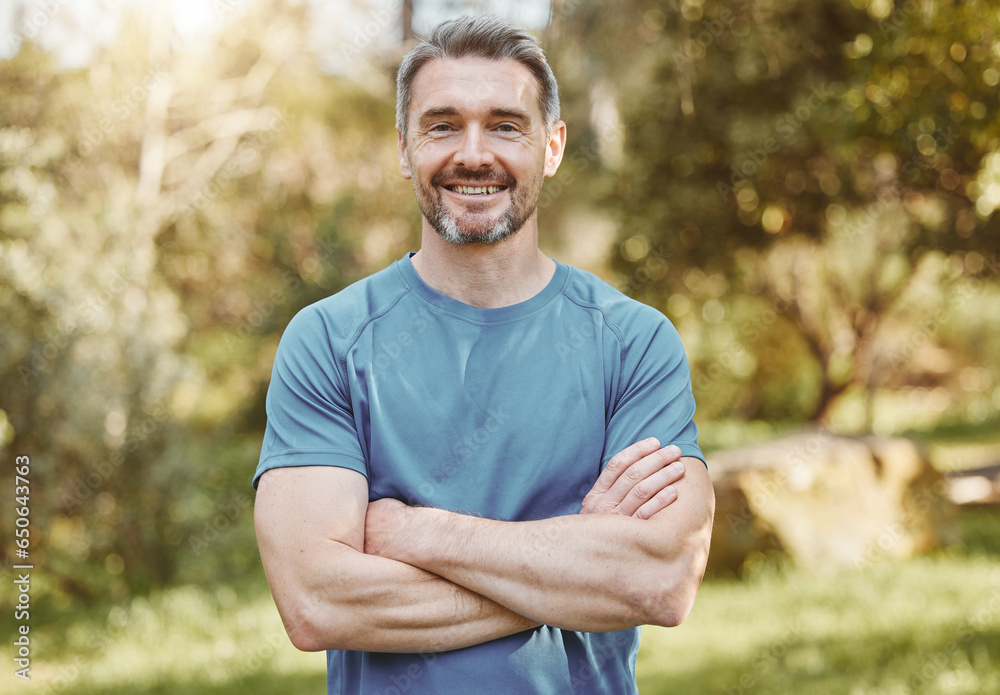 Senior, fitness and portrait of man with arms crossed in a park happy with workout, running or results. Exercise, face and elderly male runner smile in forest for training, workout or body challenge