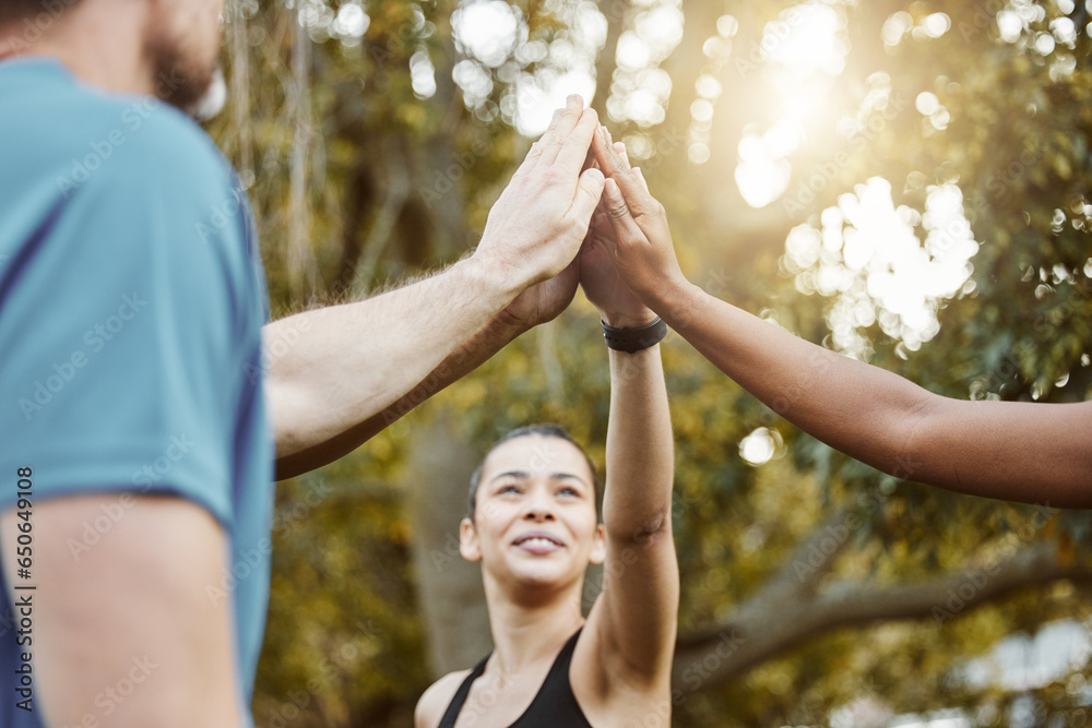 Hands, high five with exercise group and success in team of people outdoor, help and support with training. Huddle, collaboration or partnership with solidarity, trust in fitness community with goals