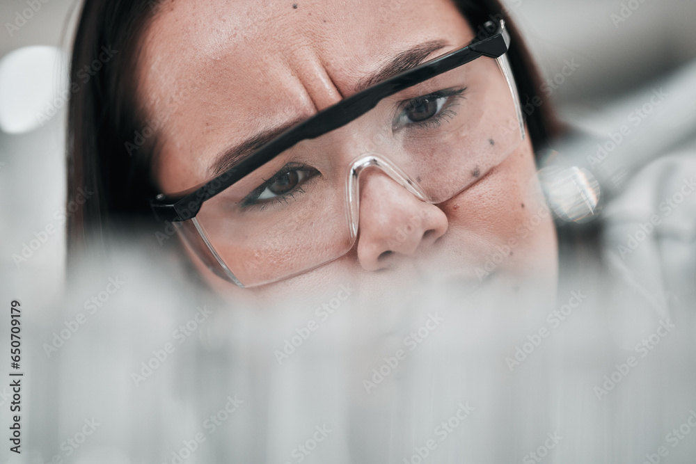 Test tubes, scientist and confused woman closeup with investigation, thinking and science research. Laboratory, clinic professional and healthcare worker with medicine and liquid check for test