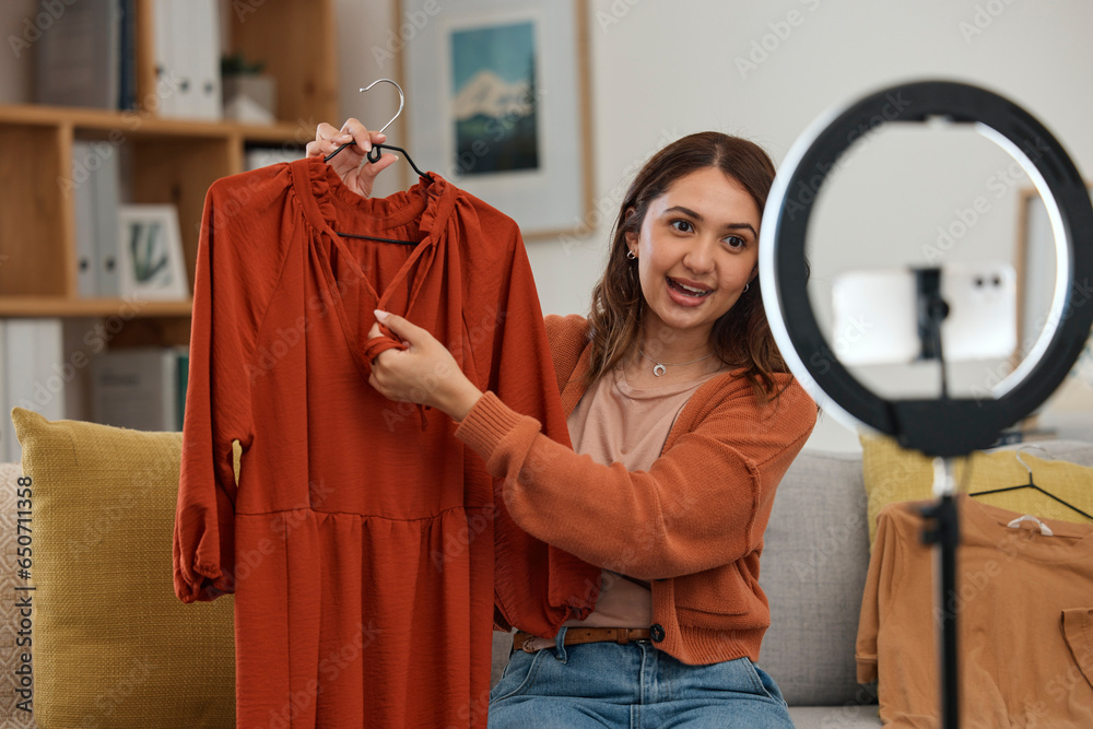 Influencer woman, show clothes and live stream with ring light, review and talking on social media app. Girl, fashion and web chat with presentation, feedback and broadcast with suggestion in home