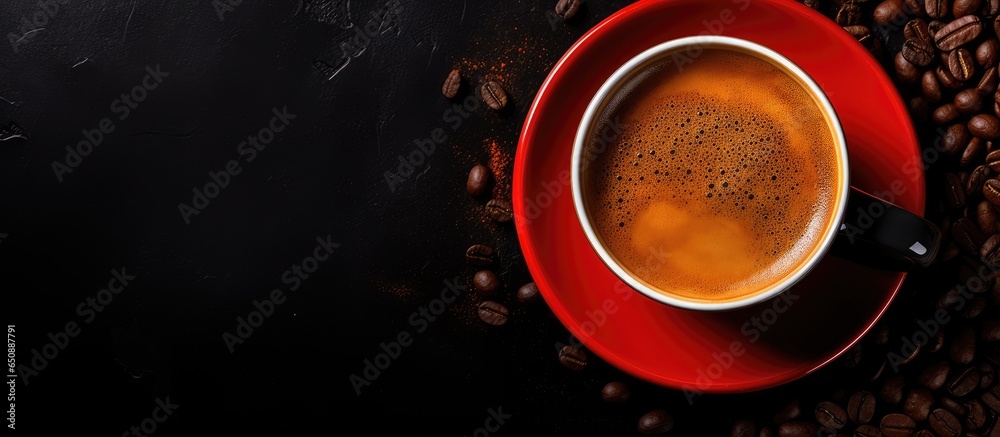 Coffee in red cup viewed from top on black background