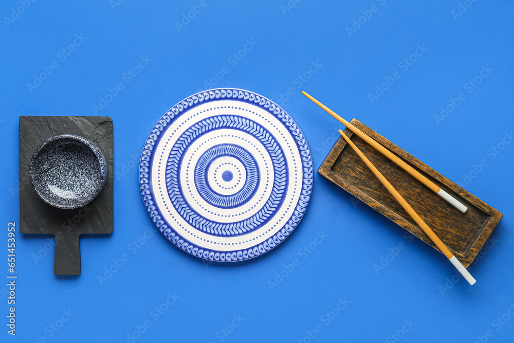 Chinese table setting on blue background