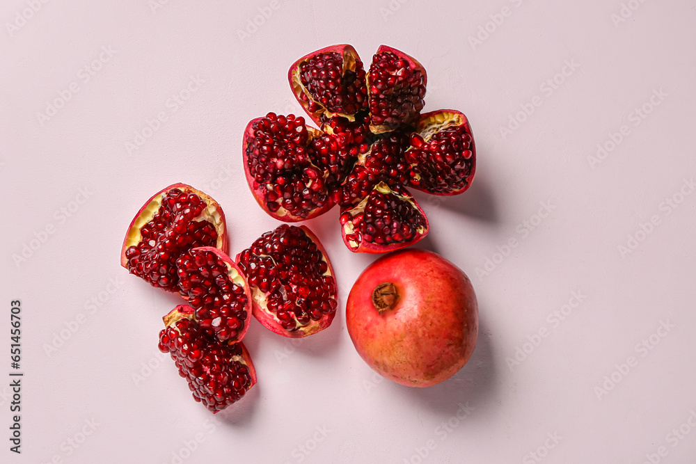 Fresh pomegranates on white background