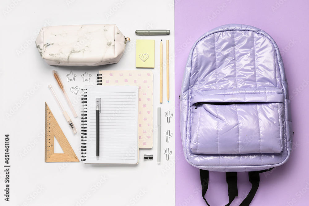 Stylish school backpack with pencil case and different stationery supplies on colorful background