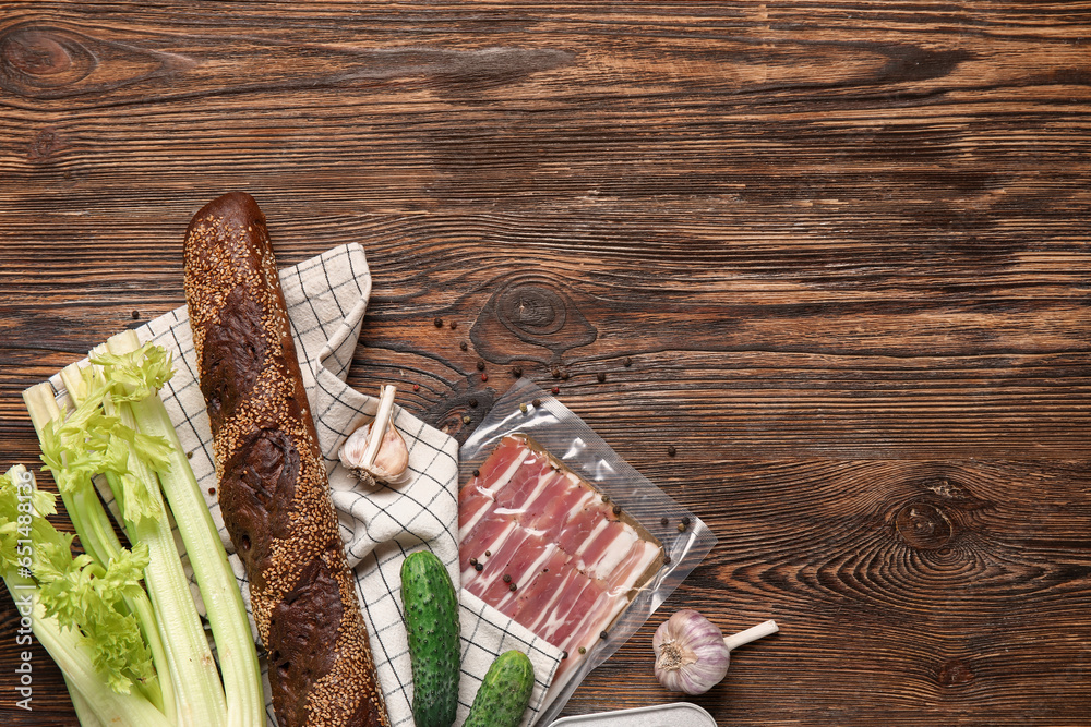 Napkin with fresh products on brown wooden kitchen table