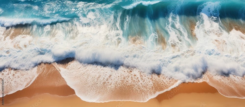 Beach view from above with ocean and waves