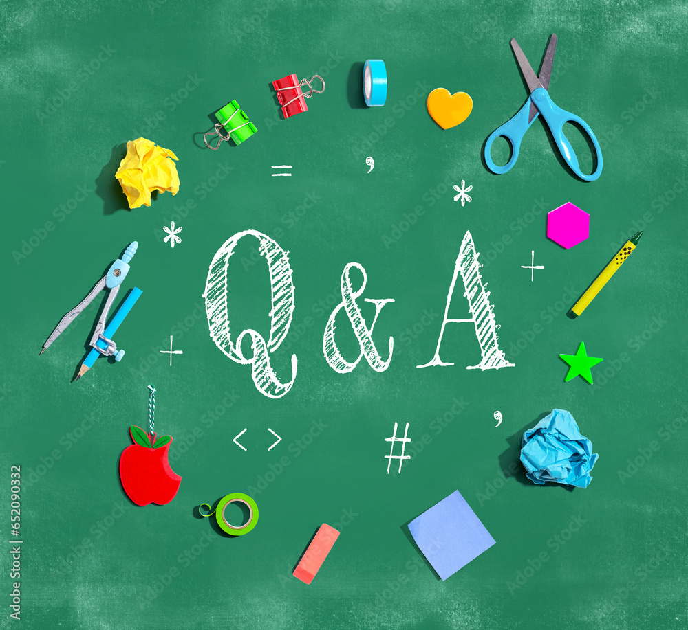 Q and A with school supplies on a chalkboard - flat lay