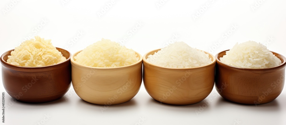 Uncooked rice bowls on white background with text sample