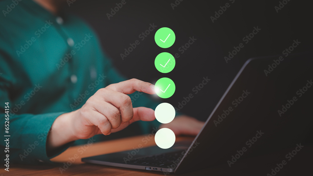 Man touch virtual screen on productivity checklist and filling survey form online. Concept of compliance to regulations product, Service, Quality control, Inspection, Standardization, certification.