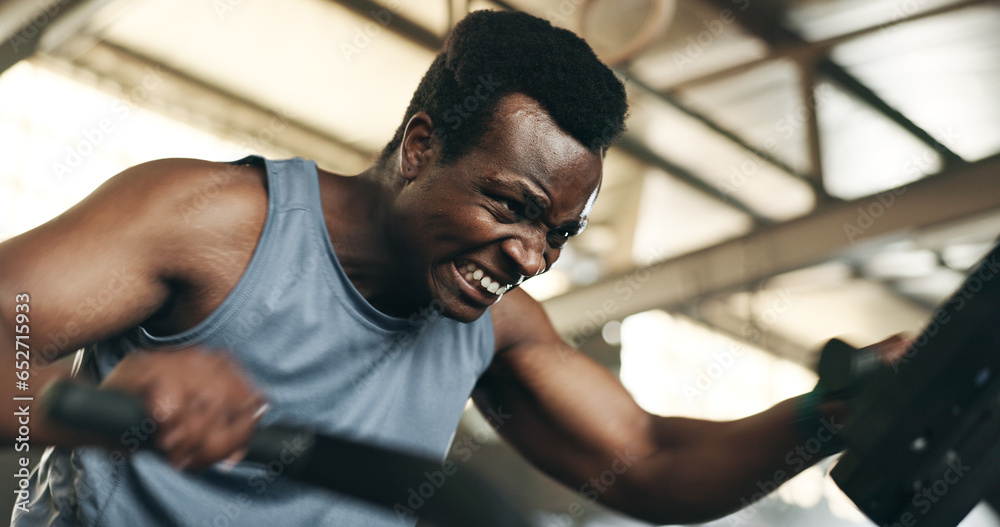 Black man, fitness and cycling at gym in cardio workout, exercise or intense training on machine. African male person on bicycle equipment in sweat or running for muscle, endurance or stamina at club