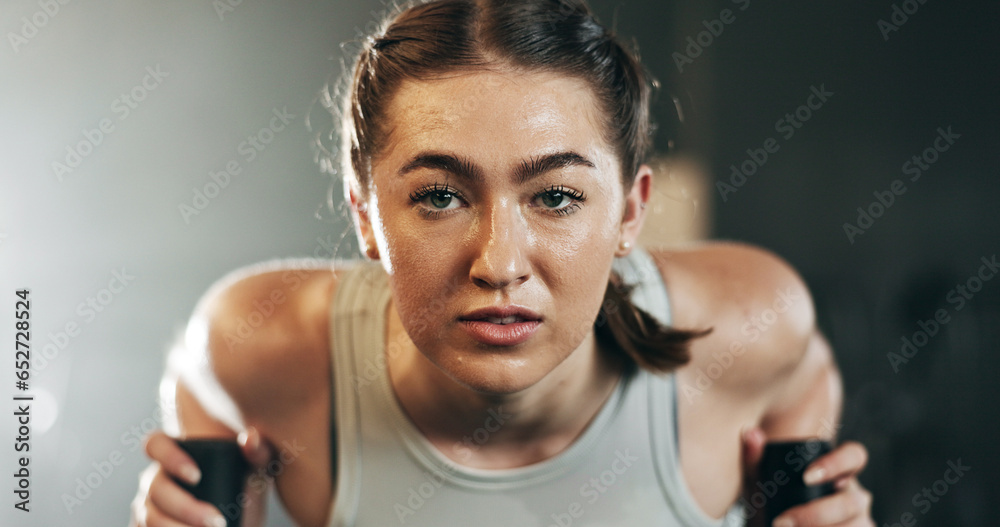 Woman at gym, weight sled and muscle building endurance, strong body and balance power in fitness. Commitment, motivation and bodybuilder in workout challenge for health and wellness on push machine.