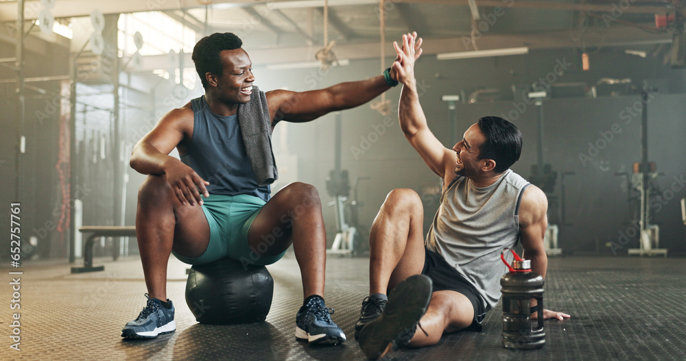 Happy man, high five and fitness in sports motivation, teamwork or partnership at the gym. People touching hands in workout, exercise or training together for physical health or wellness at gymnasium