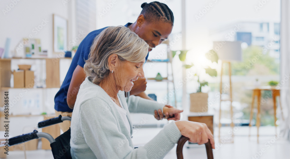 Help, talking and carer with a disabled woman in a house for a consultation, support or service. Happy, disability and an African male nurse helping senior woman from a wheelchair in nursing home