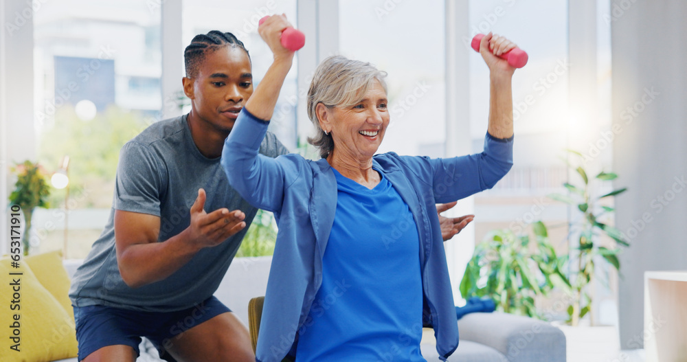 Rehabilitation, strong and woman with a physiotherapist for exercise, strength training and support. Help, fitness and a senior patient lifting dumbbells with black man in physiotherapy for recovery