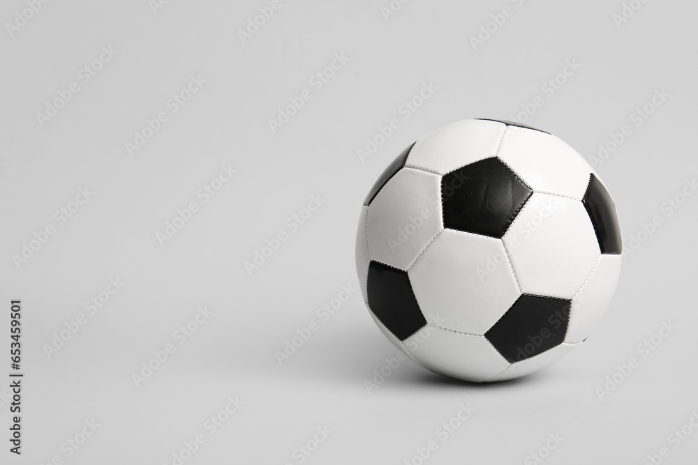 Soccer ball on light background