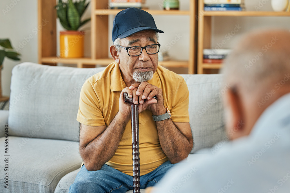 Doctor, consultation and senior man on sofa with walking stick or counselling discussion in therapy with psychologist. Elderly patent, talking and therapist listening on couch in mental health office