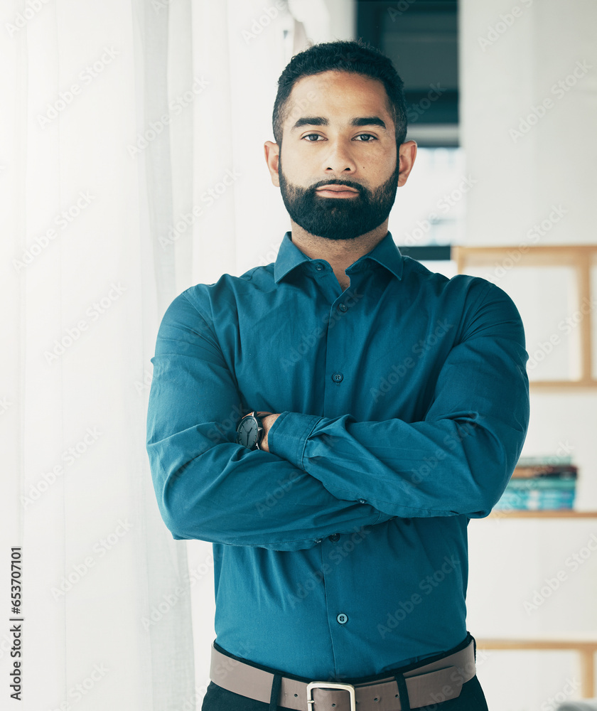 Portrait, serious and business man with arms crossed in office, startup company and workplace for creative career. Face, professional entrepreneur and confident designer, employee or worker in Brazil