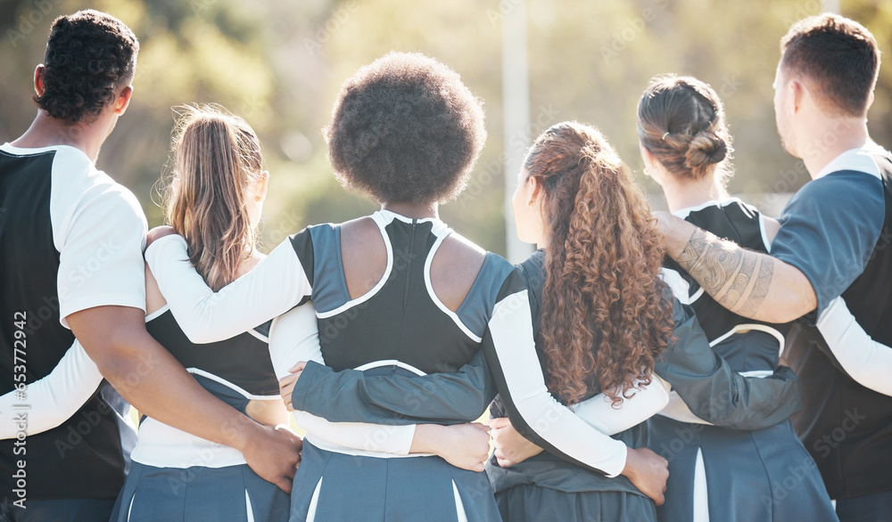 Cheerleader group, sports and people huddle for competition support, solidarity and audience watch game. Cheerleading, athlete team and dancer hug, back and crowd view contest, match or tournament