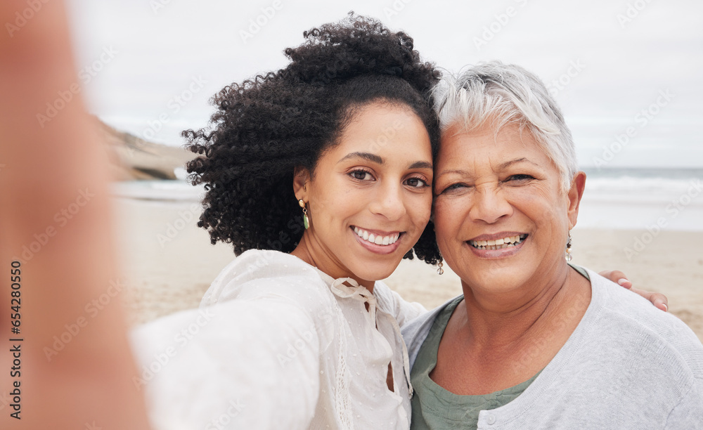 Family, women and selfie on beach for travel, vacation or adventure in nature with happiness and profile picture. Portrait, mother and daughter together with smile for holiday update by ocean or sea