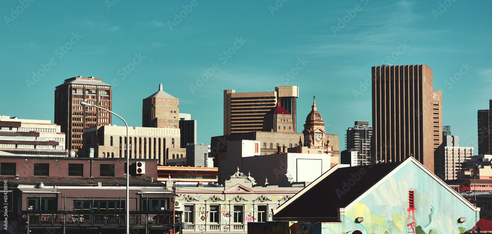 City, buildings and architecture with landscape for urban infrastructure or skyscraper outdoor in New York. Development, town and skyline with cityscape, tower and hotel with modern exterior or roof