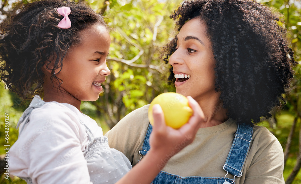 Happy, lemon and mother with girl, outdoor and happiness with hug, excited and bonding on vacation. Family, mama and kid with mom, child and fruit with a smile, citrus and nutrition with break or joy