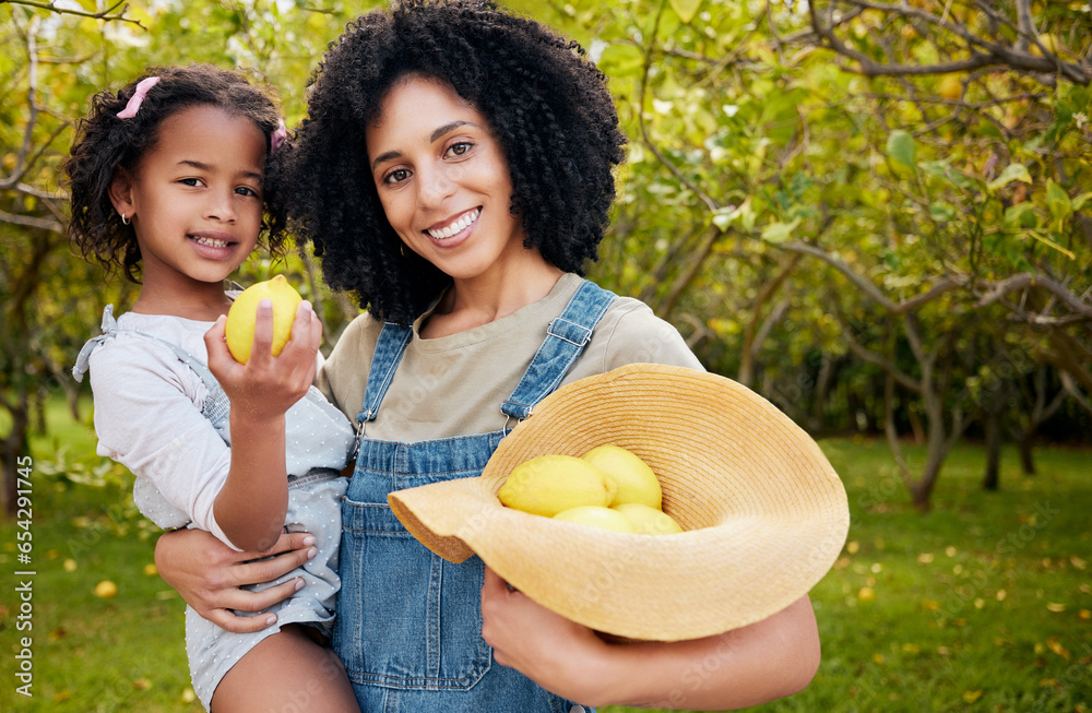 Woman with child, lemon orchard and nature, agriculture with healthy food and nutrition, portrait on citrus farm outdoor. Farmer, mother and daughter time picking fruit and smile, harvest and bonding