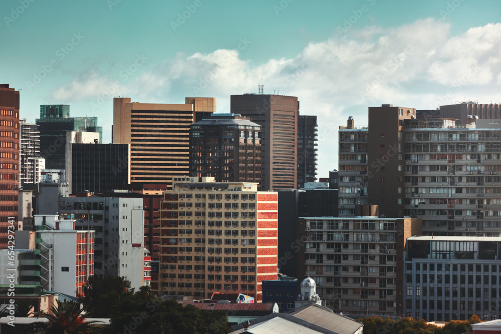 City, buildings and skyscraper with landscape for town infrastructure or architecture outdoor in New York. Development, urban and skyline with cityscape, tower and hotel with modern exterior or roof