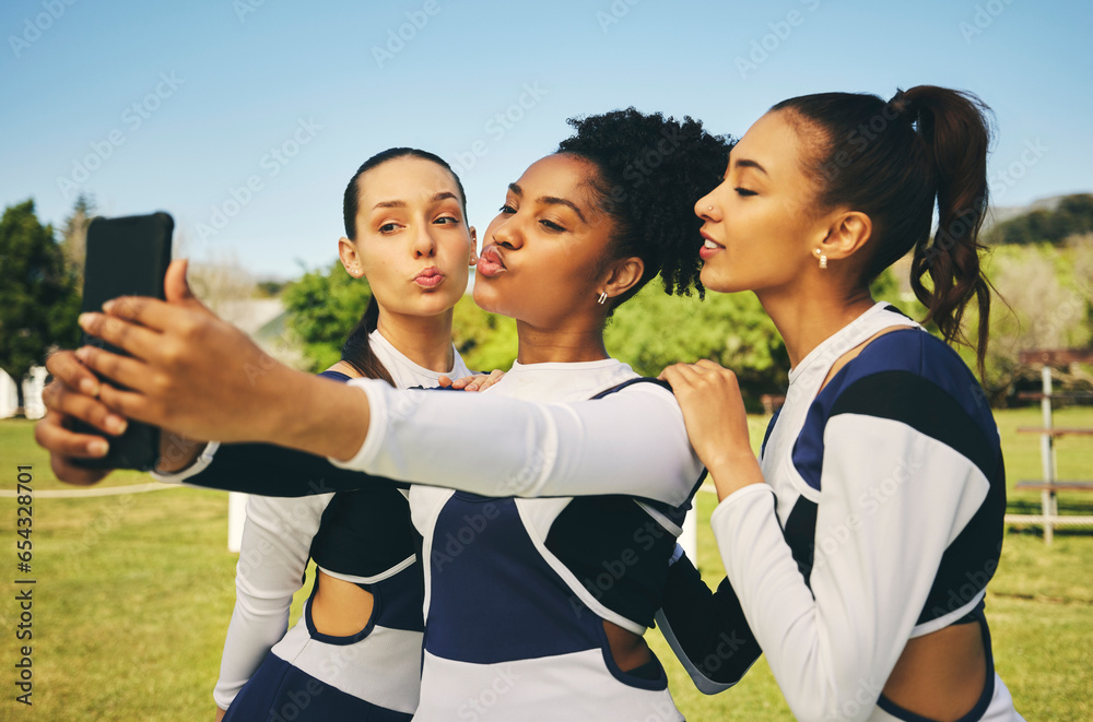 Field, women or cheerleaders in team selfie at a game with support in sports training, exercise or fitness workout. Female athletes, teamwork or young people in a social media picture or group photo