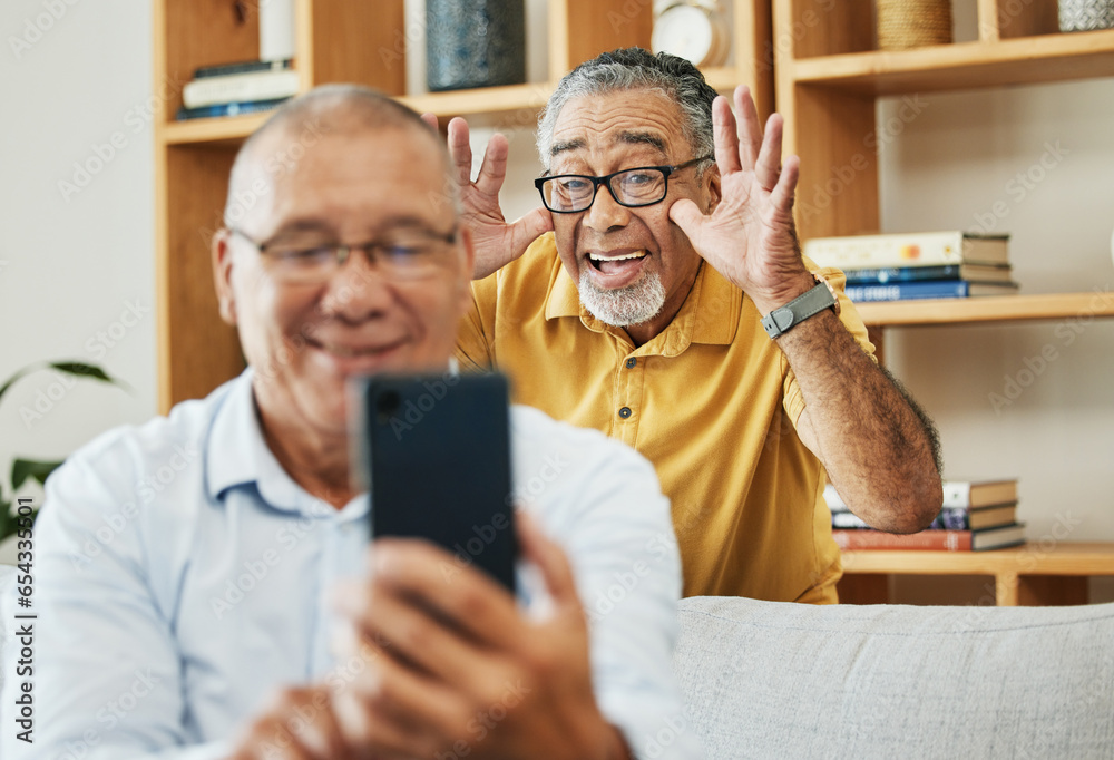 Funny, selfie and men in a house as friends in retirement for relax, comedy and internet. Happy, together and senior or elderly people with a phone for a photo or video call with a comic gesture