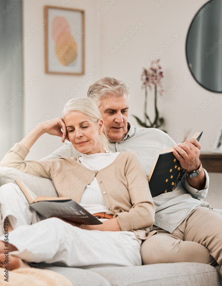 Old couple, reading book and couch in home for learning relax or retirement, storytelling or happiness. Elderly people, sofa or lounge for connection or information, knowledge or bonding in apartment