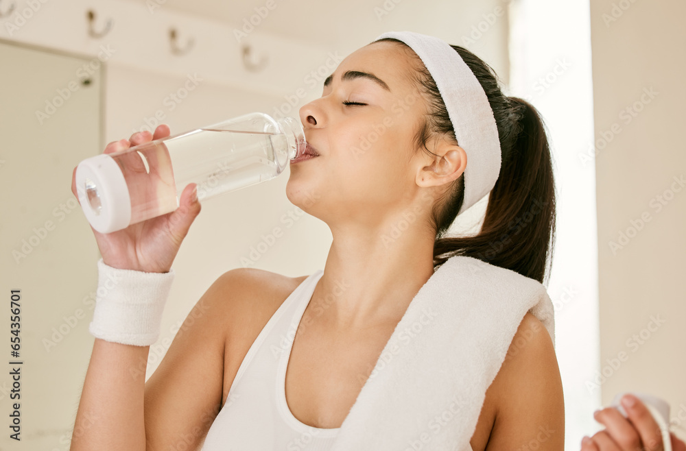 Fitness, drinking and woman with a water bottle for tennis practice, training or workout. Sports, exercise and young female athlete enjoying a healthy beverage for hydration for a game or match.