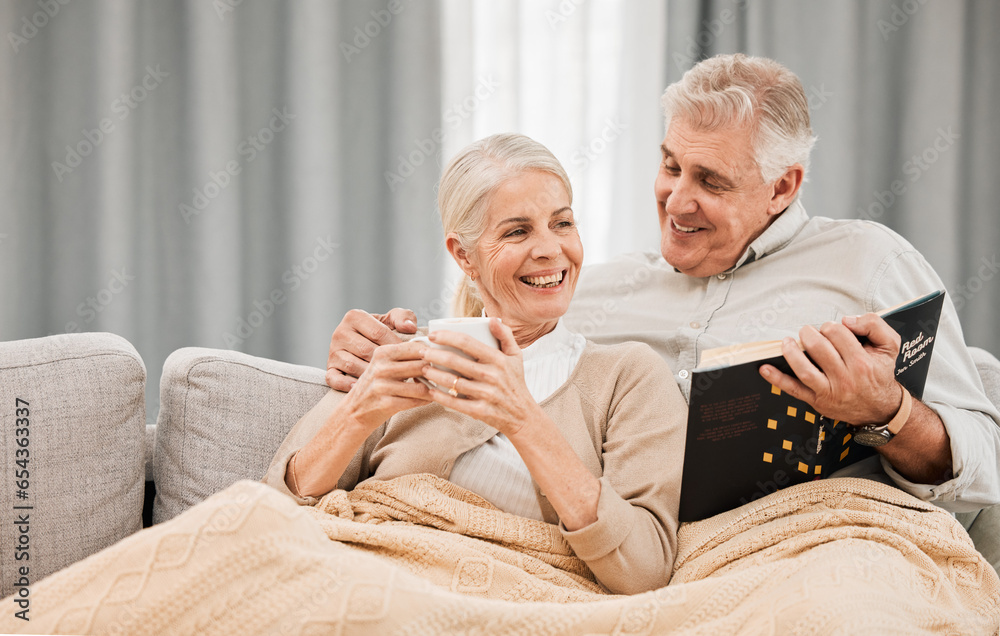 Senior, couple coffee and reading book on a living room sofa with love, smile and retirement in a home. Elderly people, story and lounge on couch with study for knowledge in a house happy and relax