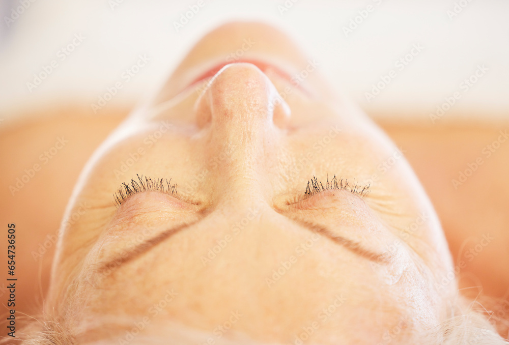 Relax, sleeping and senior woman at a spa for health, wellness and anti aging skincare treatment. Calm, beauty and closeup of elderly female person with wrinkles face routine at a natural salon.