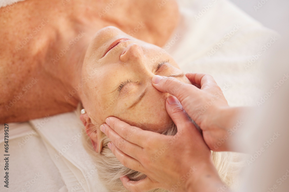 Relax, head massage and senior woman at a spa for luxury, self care and muscle healing treatment. Health, wellness and elderly female person on a retirement retreat for body therapy at natural salon.