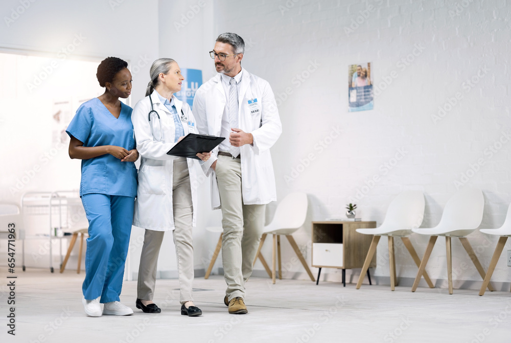 Checklist, team of doctors and nurse in discussion, planning and walking in hospital. Group of medical workers on clipboard, paperwork chart and people in meeting for healthcare of student and mentor