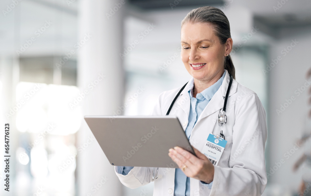 Senior woman, doctor and tablet with hospital, healthcare and wellness data in a clinic. Technology, online results and research and medical professional working and planning on the internet at job