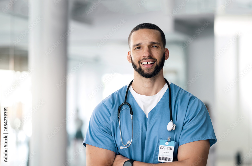 Smile, nurse and portrait of man with arms crossed in hospital for healthcare, wellness or nursing. Face of happy surgeon, confident medical professional and employee, worker and expert in Brazil