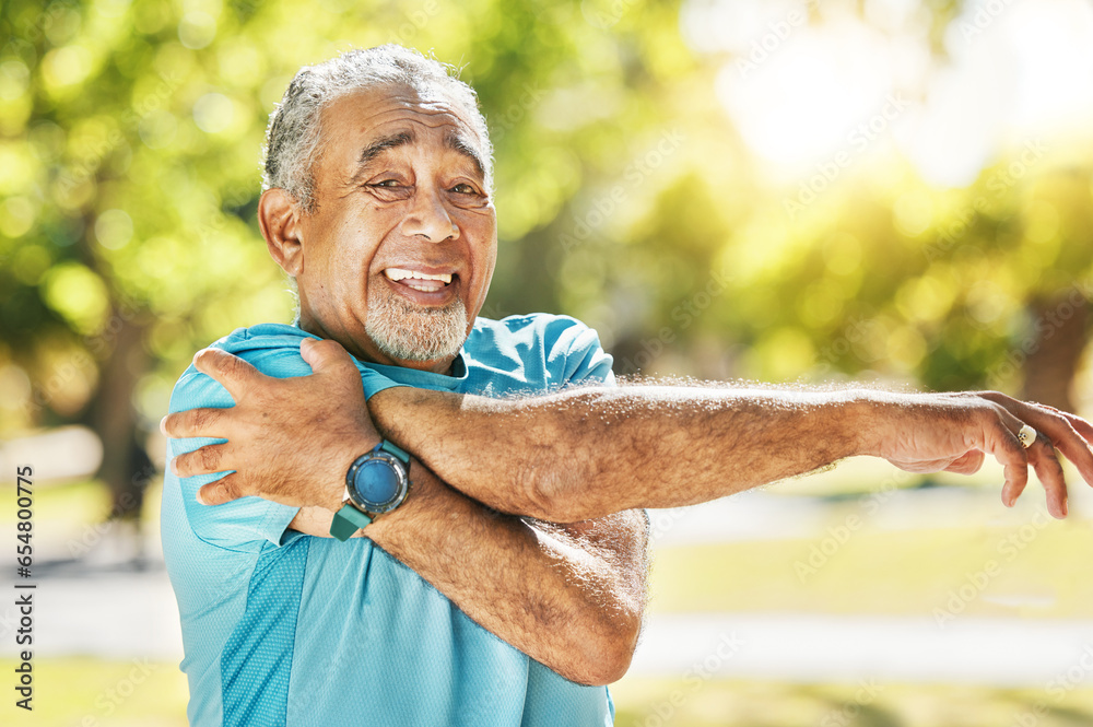 Senior man, portrait and stretching at park in fitness for workout, training or outdoor exercise. Happy mature male person in body warm up or arm stretch for preparation, health or wellness in nature